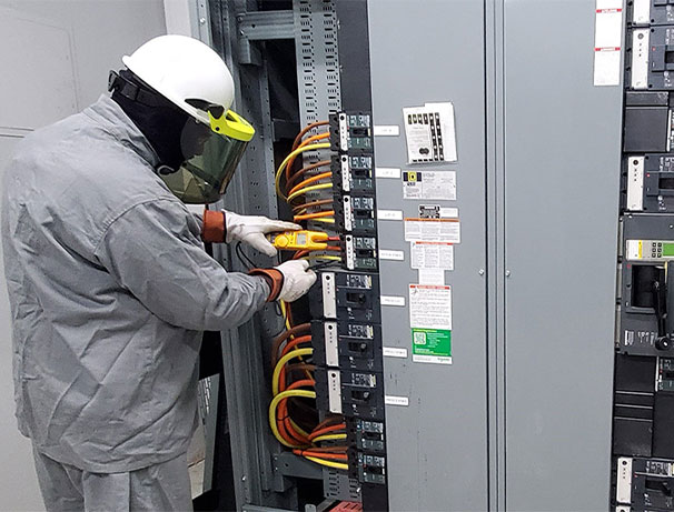 Electrician performing a job on a electrical box in Dallas